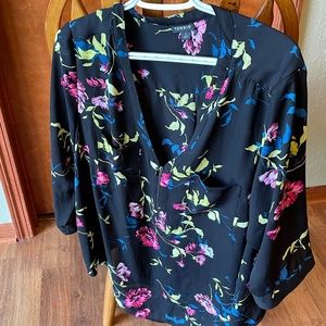 Torrid size 1 blouse black background, floral print.  3/4 sleeve, chest pockets